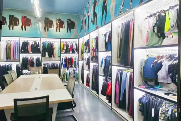 Modern showroom with equestrian gear samples displayed on racks